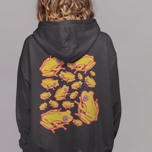May include: Black hoodie with a pattern of yellow frogs on the back.