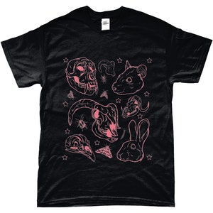May include: Black t-shirt with a pink graphic print of various animal skulls, insects, and stars.