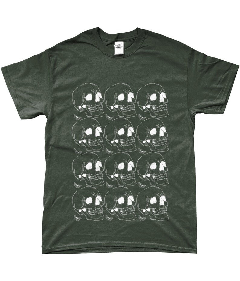 May include: A dark green t-shirt with a white skull pattern. The skulls are arranged in a grid pattern and are repeated throughout the shirt.