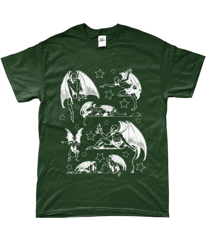 May include: A dark green t-shirt with a white print of multiple winged figures with stars. The figures are in various poses, some flying, some sitting, and some lying down.