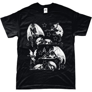 May include: Black t-shirt with a white print of multiple winged figures with stars. The figures are in various poses, some are flying, some are sitting, and some are lying down.