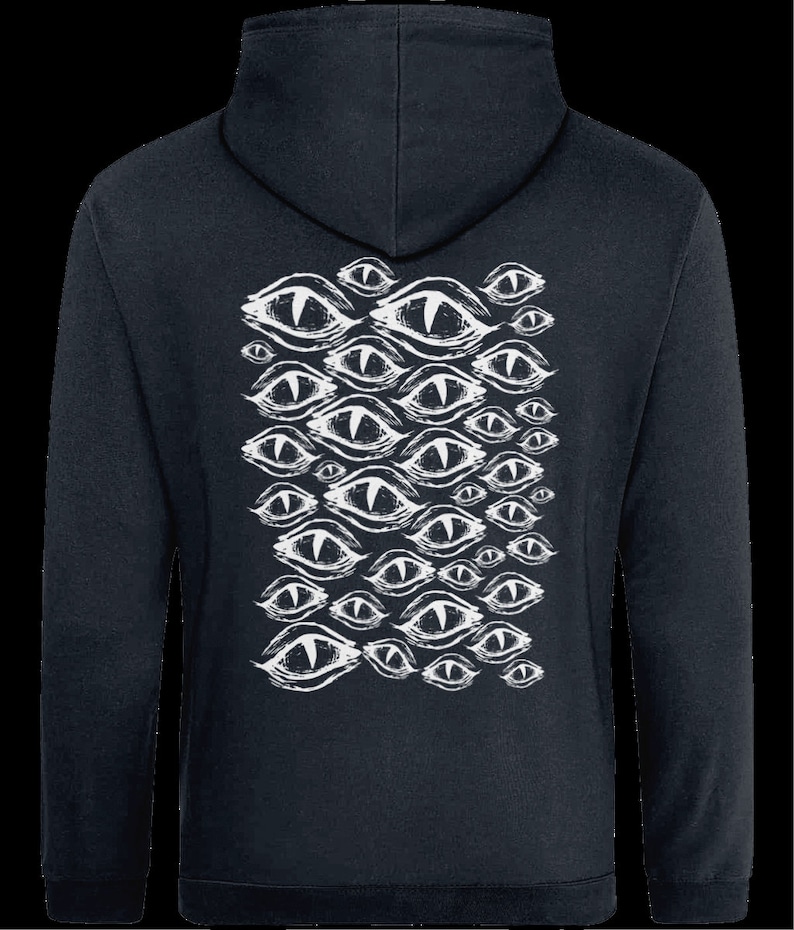 May include: A dark blue hooded sweatshirt with a white print of multiple stylized eyes on the back.