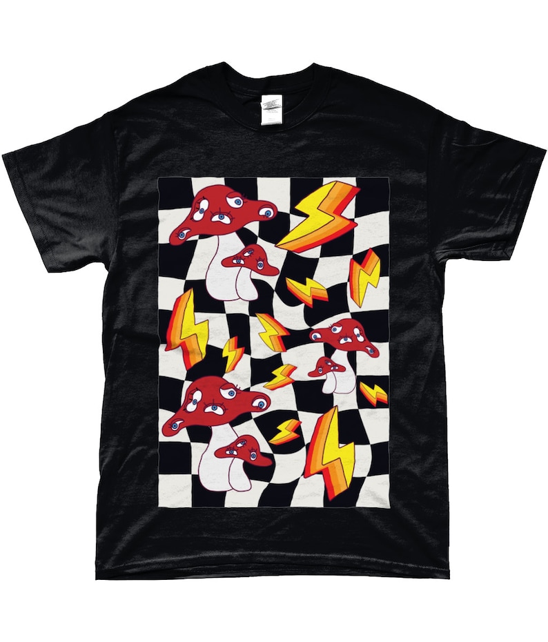 May include: Black t-shirt with a graphic print of red mushrooms with eyes and yellow lightning bolts on a black and white checkered background.