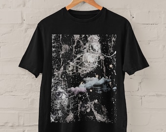 May include: Black t-shirt featuring a graphic print of a celestial scene with clouds, stars, and eyes. The print has a distressed, vintage look.