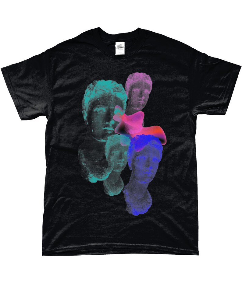 May include: Black t-shirt with a graphic print of multiple colorful, abstract, and layered faces. The faces are reminiscent of ancient Greek or Roman sculptures.