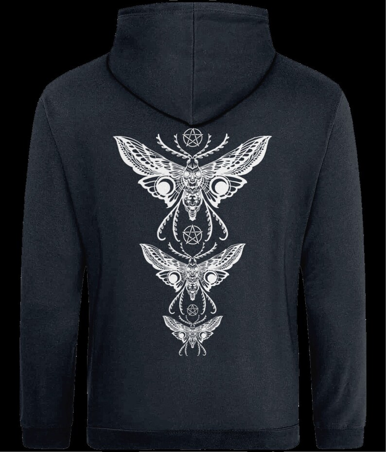 May include: A dark blue hooded sweatshirt with a white graphic print of three stylized moths with pentagram symbols. The moths are arranged vertically with the largest moth at the top and the smallest moth at the bottom.