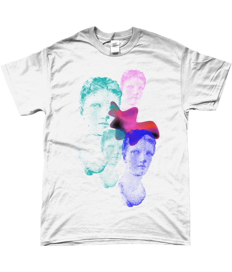 May include: White t-shirt with a graphic design of three blue, green, and pink stylized faces with a red, pink, and blue abstract shape.