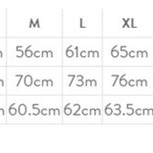 May include: Size chart showing measurements in centimeters for a garment. Measurements include half chest, body length, and sleeve length. Sizes range from XS to 5XL.