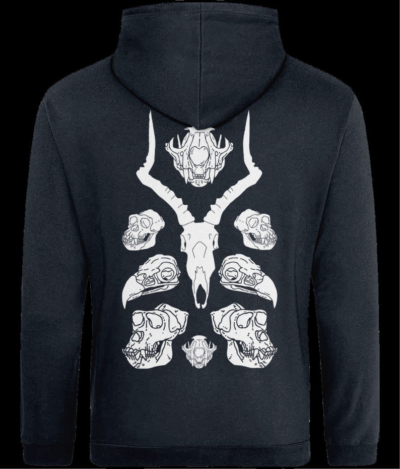 May include: A dark blue hoodie with a white design of animal skulls. The design features a deer skull in the center with two antelope skulls on either side. There are also two bird skulls and two monkey skulls.