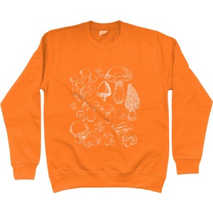 Puede incluir: Sudadera naranja con un estampado gr&aacute;fico blanco de varios tipos de setas.
