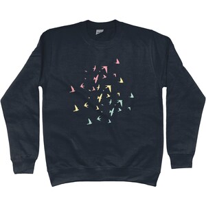 May include: A dark navy blue sweatshirt with a flock of pastel coloured birds printed on the front.