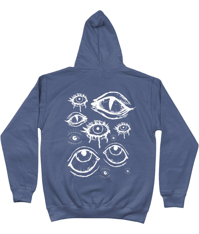 May include: A dark blue hooded sweatshirt with a white graphic print of multiple eyes on the back.