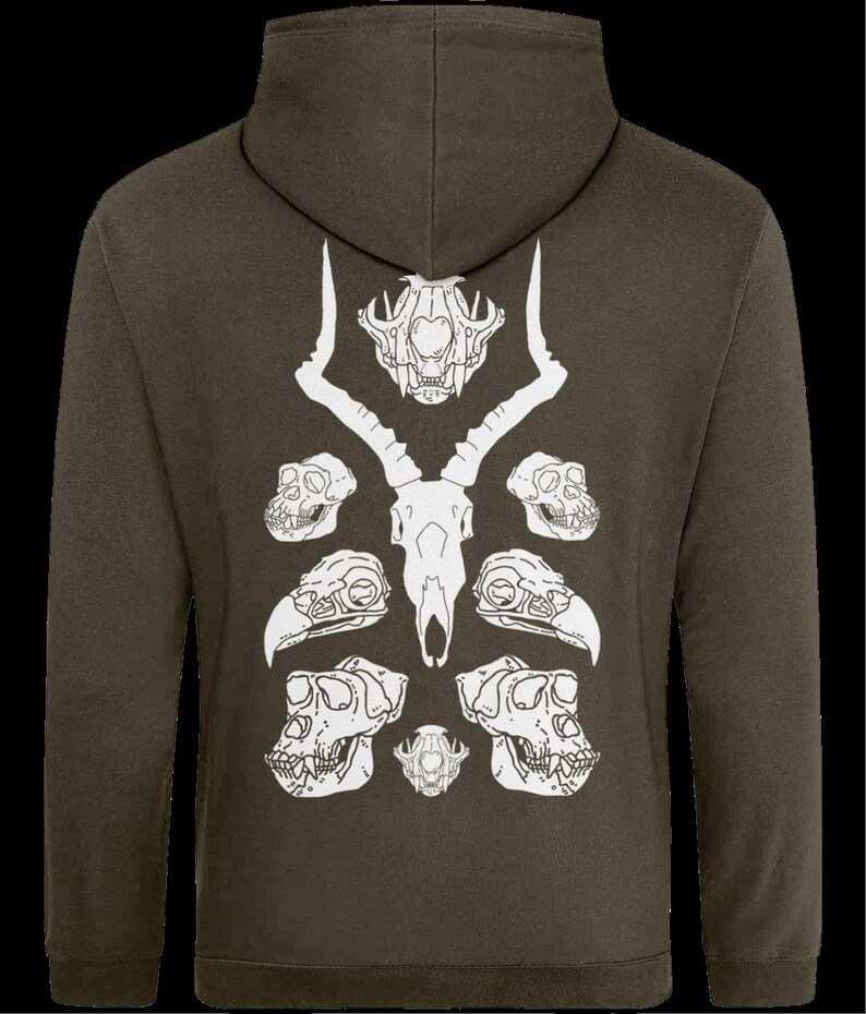 May include: A dark green hooded sweatshirt with a white graphic design of animal skulls. The design features a deer skull with antlers, two monkey skulls, two bird skulls, and a smaller skull in the center.