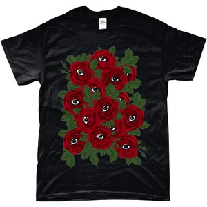 May include: Black t-shirt with a graphic of red roses with eyes in the center of each rose.