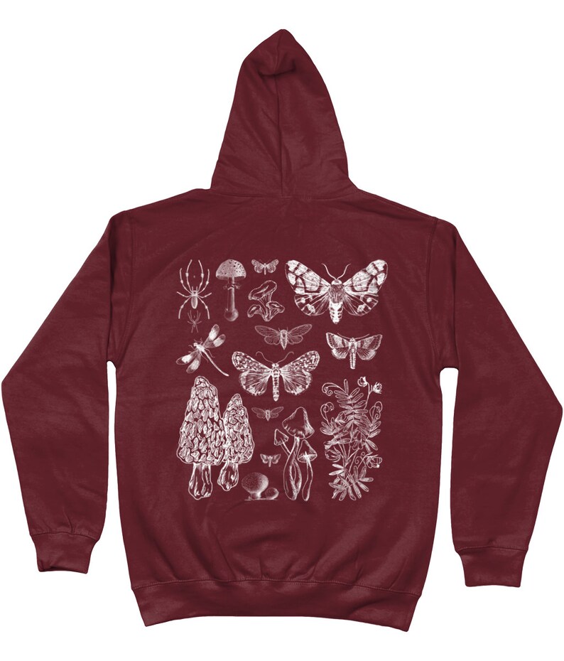 May include: Burgundy hooded sweatshirt with a white print of various insects, mushrooms, and plants. The print includes a spider, dragonfly, butterflies, moths, and mushrooms.