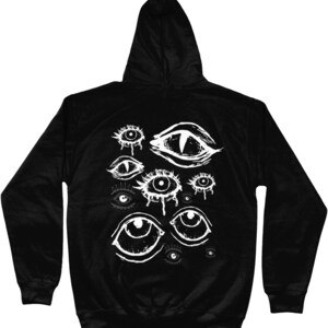May include: Black hooded sweatshirt with a white graphic print of multiple stylized eyes. The eyes are drawn in a variety of styles, some with tears, some with pupils, and some with a more abstract design.