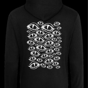 May include: Black hooded sweatshirt with a white graphic print of multiple stylized eyes.