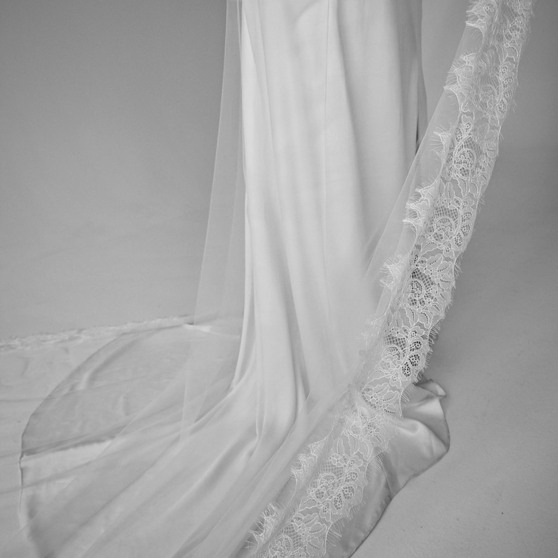 Chantilly lace trim detail on handmade wedding veil in light ivory
