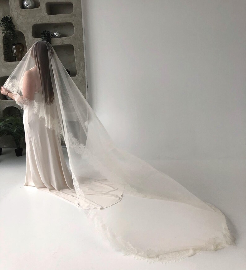 Full length cathedral wedding veil with blusher, light ivory tulle and delicate Chantilly lace trim