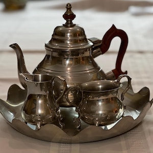 This Williamsburg Restoration Stieff Pewter Tea Service Set