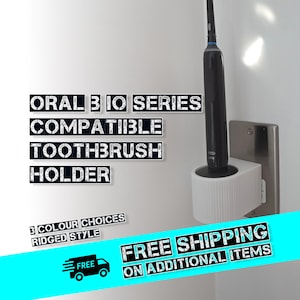 May include: A black electric toothbrush in a white, ridged-style holder mounted on a wall. The holder is designed for Oral B IO series toothbrushes. Text on the image reads "ORAL B IO SERIES COMPATIBLE TOOTHBRUSH HOLDER".