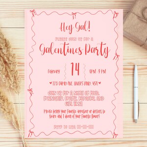 May include: Pink invitation with a red border and text that says "Hey Gal! Please join us for a Galentines Party" with the date "February 14" and time "6PM-9PM". The address is "123 Cupid Ave, Lovers Land USA". The invitation also says "Join us for a night of food, friendship, crafts, karaoke and girl time!" and "Please bring your favorite appetizer or dessert to share and 1 dozen of your favorite flower!" The phone number is "RSVP to USA 101-000-0000".