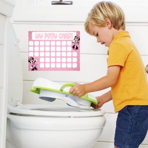 May include: A pink potty chart with the text "MY POTTY CHART" and Minnie Mouse graphics. A child is placing a white and green potty seat on a white toilet. The chart has a grid of squares for tracking progress.