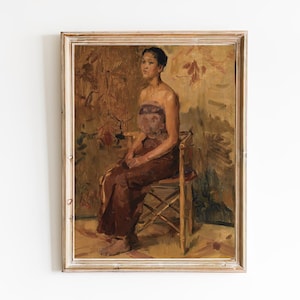 May include: A framed oil painting depicting a woman seated on a chair. The woman is wearing a brown dress and has dark hair. The background is a muted brown with a floral pattern.