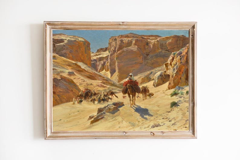 May include: A painting depicting a caravan of camels traveling through a desert canyon. The camels are laden with goods and are led by a person on horseback. The painting is done in a realistic style and features warm, earthy colors.