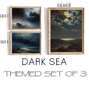 May include: A set of three framed prints depicting dark sea scenes with stormy skies and a moonlit ocean. The prints are in wooden frames with a light brown finish. The text "DARK SEA" and "THEMED SET OF 3" is printed below the images.