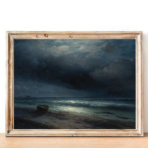 May include: A framed painting depicting a seascape at night. The painting shows a dark, stormy sky with a sliver of moon shining through the clouds. The sea is choppy and the waves are crashing on the shore. A small boat is visible in the distance.