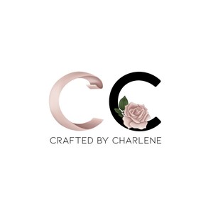 May include: A logo with the letters "CC" in black and pink. The "C" on the right has a pink rose with green leaves inside. The text "CRAFTED BY CHARLENE" is below the letters.