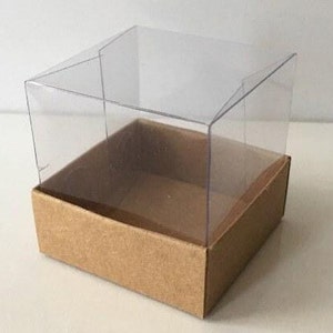 Caja de cartón para regalos de boda de 5 x 5 x 5 cm con tapa transparente.