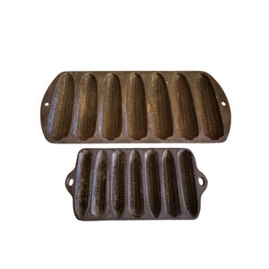 Vintage Lodge gietijzeren maïsbroodpannen set van 2 model 27C2 in de VS gemaakte rustieke bakvormen voor maïsmuffins