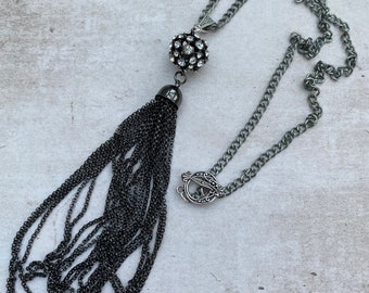 Gun metal silver tassel pendant on antiqued silver chain