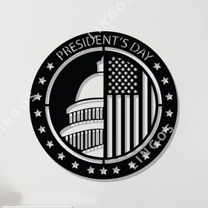 May include: A black and white President's Day design featuring the Capitol Building and an American flag. The design is surrounded by a circle of stars.