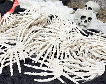 Skeleton Hand Bones: Halloween Decoration, Party Favors  2pc. Parties, Prop Supplies.