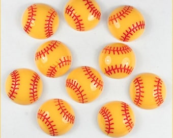 May include: Ten yellow and red softball-shaped embellishments with red stitching.