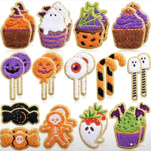 May include: A collection of embroidered patches featuring Halloween-themed designs including cupcakes, ghosts, jack-o'-lantern lollipops, eyeballs, candy canes, wrapped candies, a skeleton gingerbread person, a ghost strawberry, and a green monster cupcake.