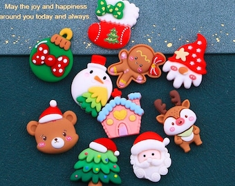 May include: Assortment of Christmas-themed resin ornaments, including a gingerbread person, a snowman, a reindeer, a Santa Claus, a Christmas tree, a stocking, a house, and a bear. The ornaments are all colorful and have a cartoonish style.