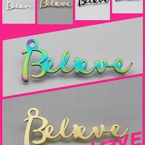 May include: A set of six metal charms with the word "Believe" written in different colors, including silver, gold, black, blue, iridescent, and gold. The charms are shown on a white background.
