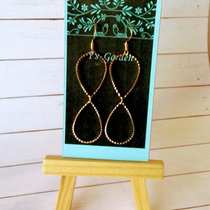 Infinity shape dangle earrings