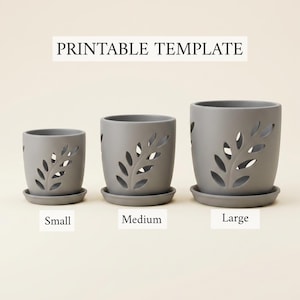May include: Three gray cylindrical plant pots with matching saucers, each featuring a cutout leaf pattern on the side. The pots are arranged by size and labeled as Small, Medium, and Large. The text PRINTABLE TEMPLATE appears at the top.