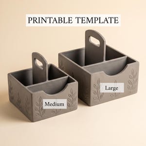May include: Two gray storage caddies with central handles and divided compartments, featuring embossed leaf patterns on the exterior. The caddies are labeled Medium and Large, with the text PRINTABLE TEMPLATE displayed above them.