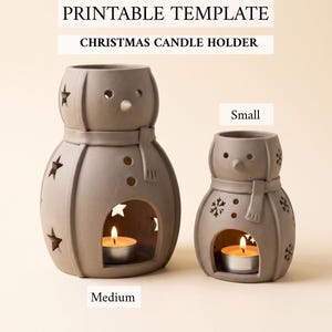 May include: Two gray ceramic snowman-shaped candle holders in medium and small sizes. The text PRINTABLE TEMPLATE CHRISTMAS CANDLE HOLDER is visible at the top. Each snowman features star-shaped cutouts and a scarf detail, with a lit tea light candle inside the base opening.