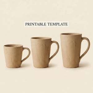 May include: Three beige ceramic mugs of varying sizes with curved handles. The mugs are arranged from smallest to largest. The text "PRINTABLE TEMPLATE" is displayed above the mugs.
