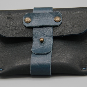 Borsa in morbida pelle di vacchetta nei colori Nero e Blu Anatra