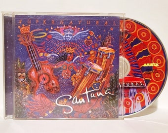 SANTANA Supernatural - Vintage 1999 CD Album Classic Rock/Blues/Latin Music Arista Records ARCD 9080 Canada Club Edition