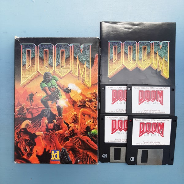RESERVED ORIGINAL DOOM -  Vintage 1993 Pc Game Collectible Complete in Big Box W/ Booklet 4 Floppy Disks +Custom Floppy add-ons Id Software