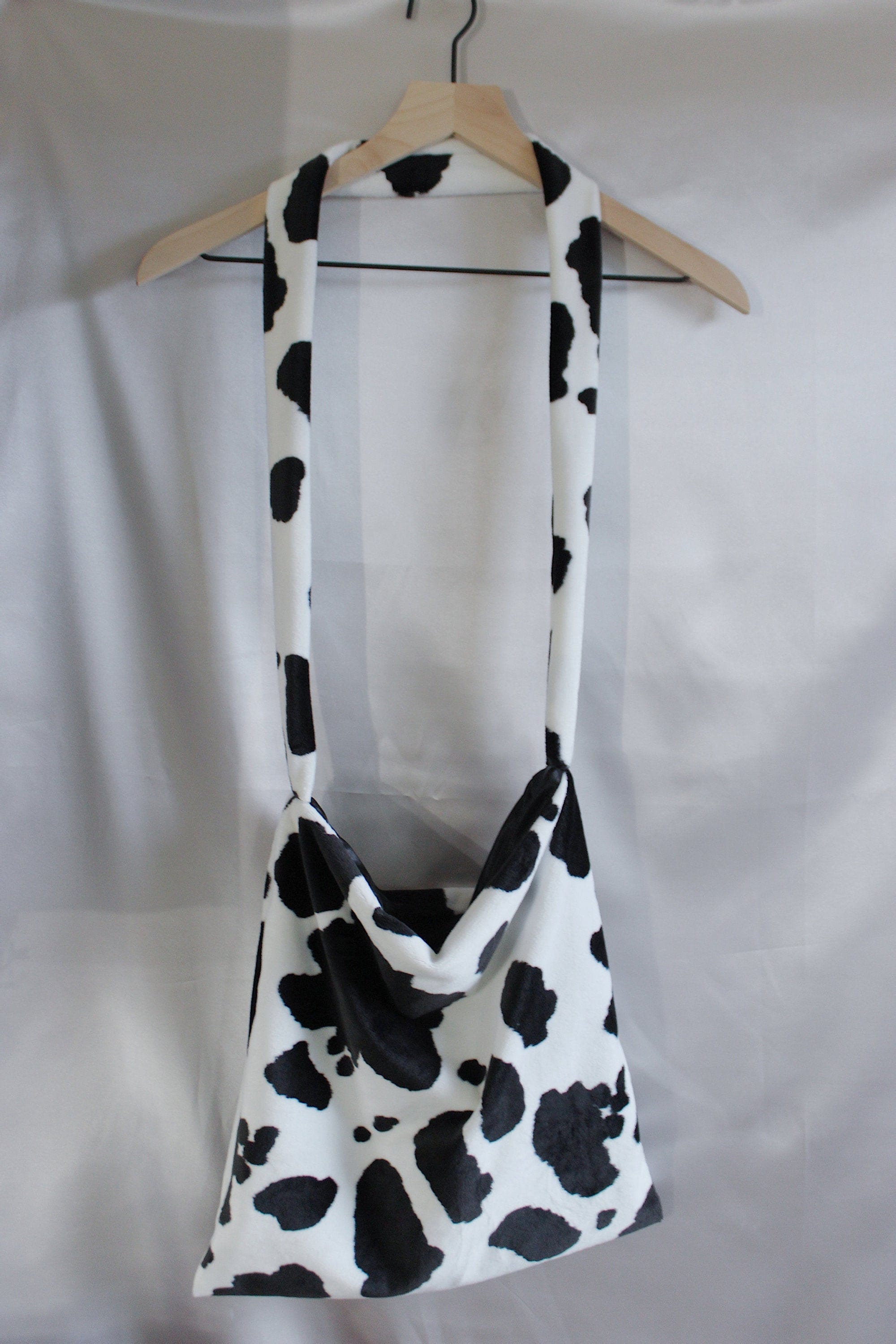 LUAR pony-hair cow-print Tote Bag - Farfetch